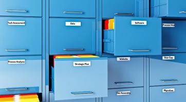 Blue file cabinet drawers are shown with some drawers open with colorful file folders inside